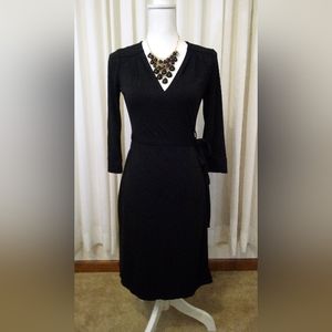 Old Navy black wrap around long sleeved dress. Size XS